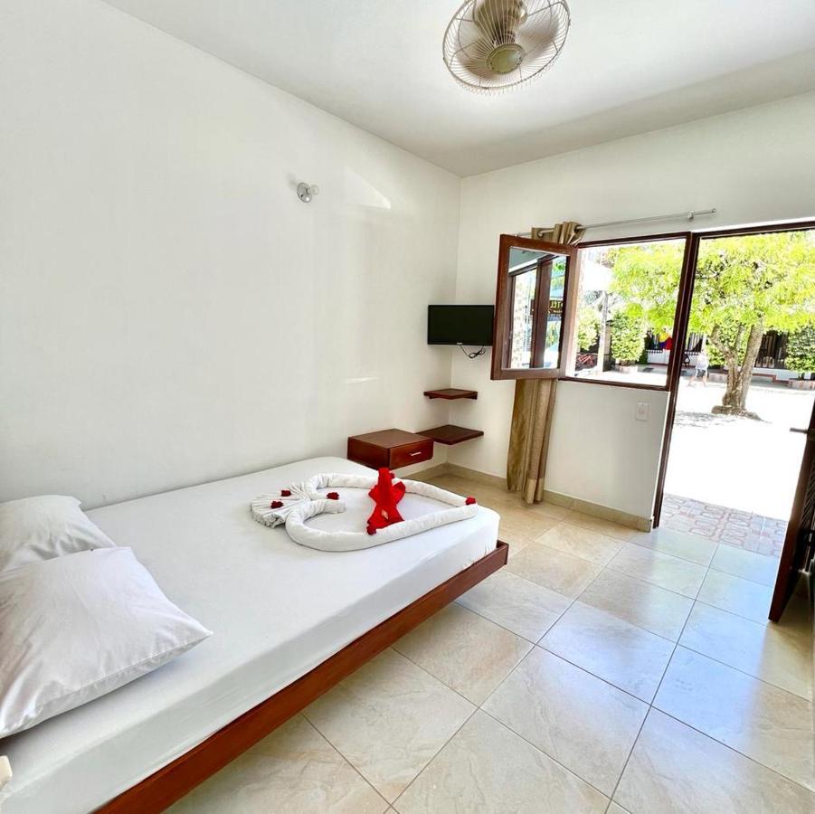 פוארטו טריונפו Hotel Paraiso Plaza מראה חיצוני תמונה